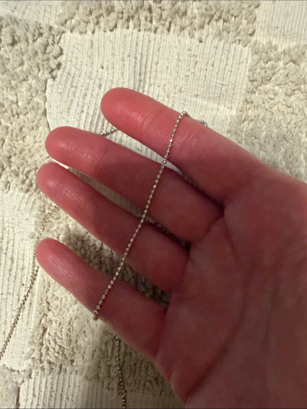 Argento Vivo Silver Tone Chain Necklace on Cream Check Towel